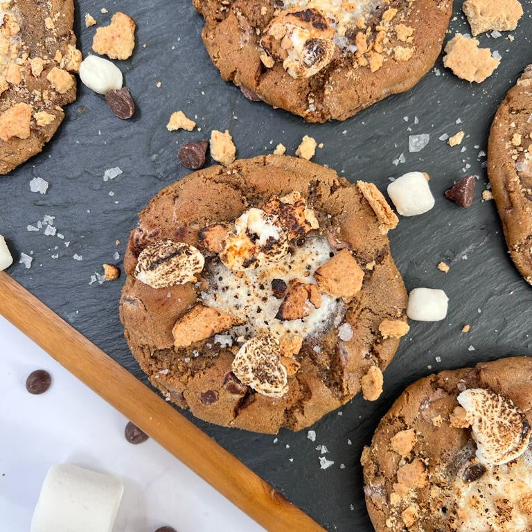 smores cookie, s'mores cookie, best smores cookie recipe, best s'mores cookie recipe, best cookies near me, best cookies san diego, gourmet cookies san diego, corporate cookie catering, fire roasted marshmallow smores, smores with graham cracker chocolate and marshmallow, marshmallow pull, gooey smores cookie, gooey s'mores cookies, best gooey s'mores cookies, best gooey s'mores cookies, best cookies san diego, gourmet cookies, best bakery san diego, best cookie bakery, cookie delivery san diego