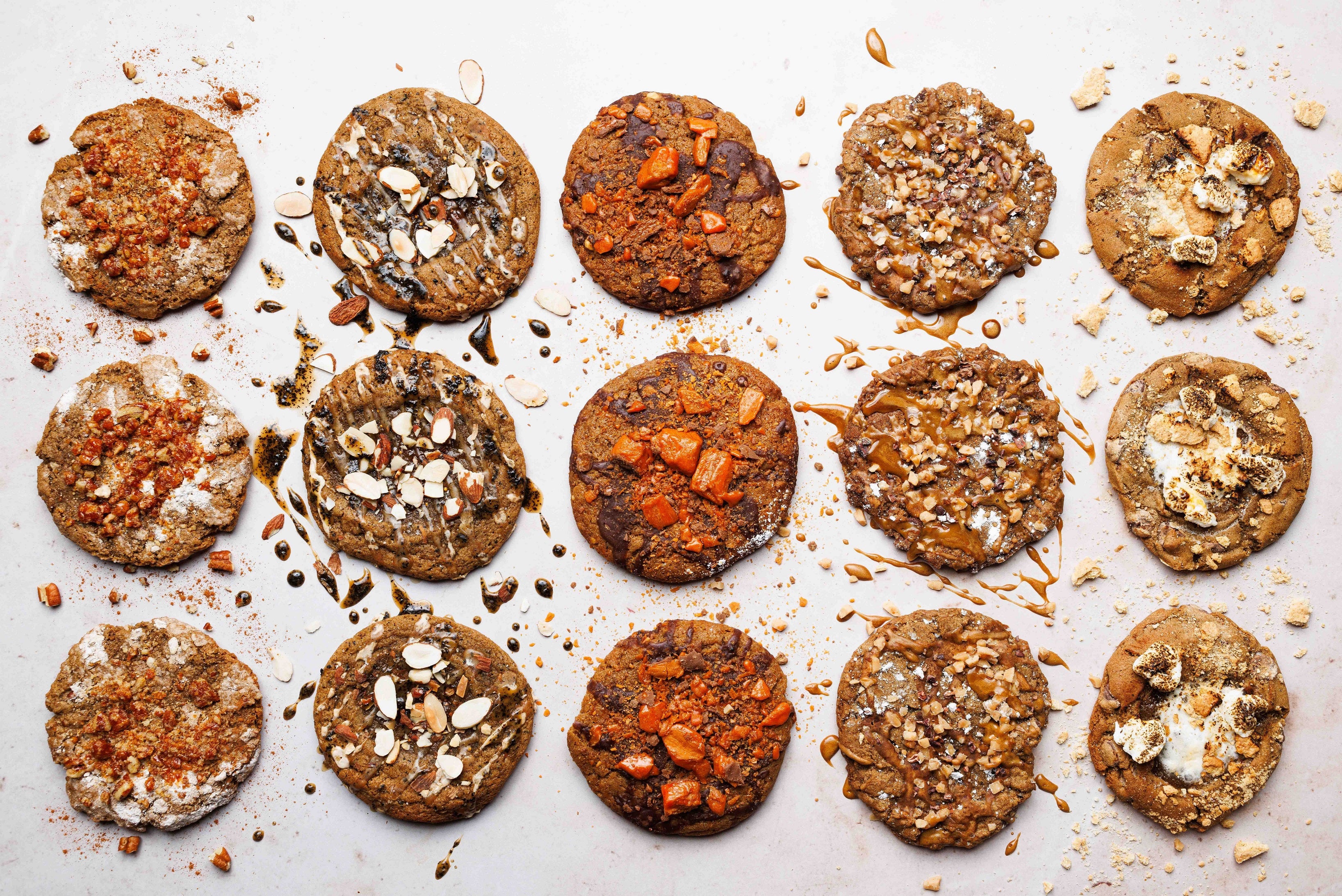 Cookie Assortment featuring the best cookies in san diego, as well as the best cookies in la jolla, best cookies in carlsbad, and the best cookies in encinitas.  Salted Brown Butter Chocolate Chip cookies, Pecan Cinnamon Roll Cookies, Espresso Toffee Chocolate Sea Salt COokies, Smores cookies, S'mores cookies, best baked goods san diego